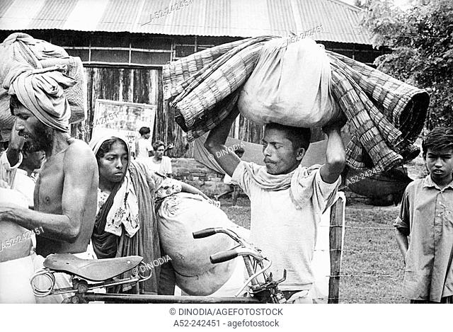 Refugees from East Pakistan arrive at Agartala in the Indian border state of Tripura after the proclamation of East Pakistan an independent state under the name...