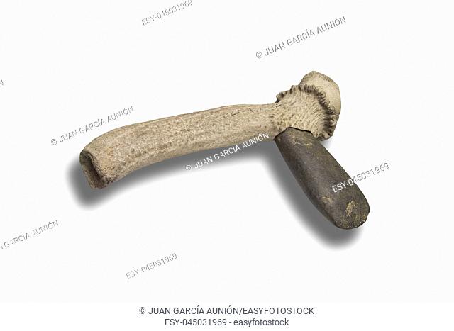 Lithic axe made with polished stone in deer antler handle. Replica. Isolated over white background
