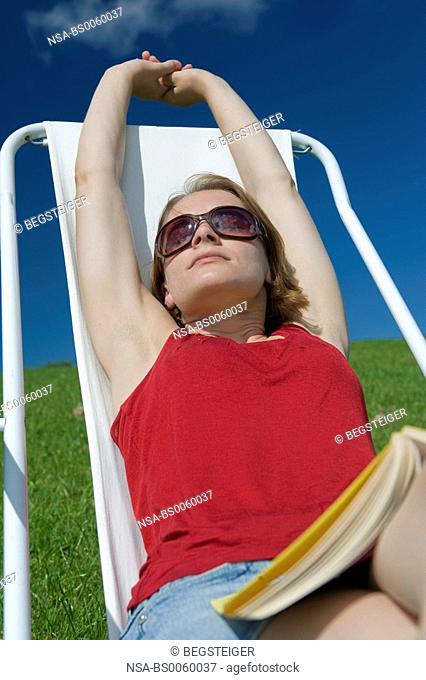 young woman relaxing in summer