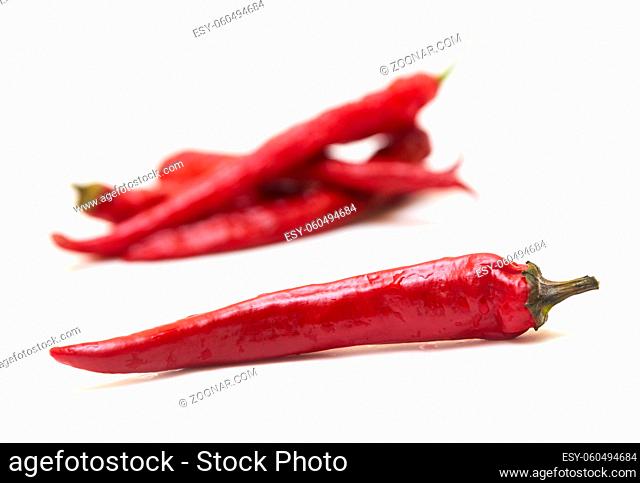 Red hot chily peppers isolated on white background