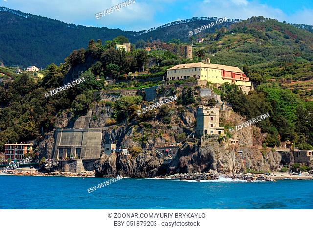 Monterosso view from excursion ship. One of five famous villages of Cinque Terre National Park in Liguria, Italy, suspended between Ligurian sea and land on...