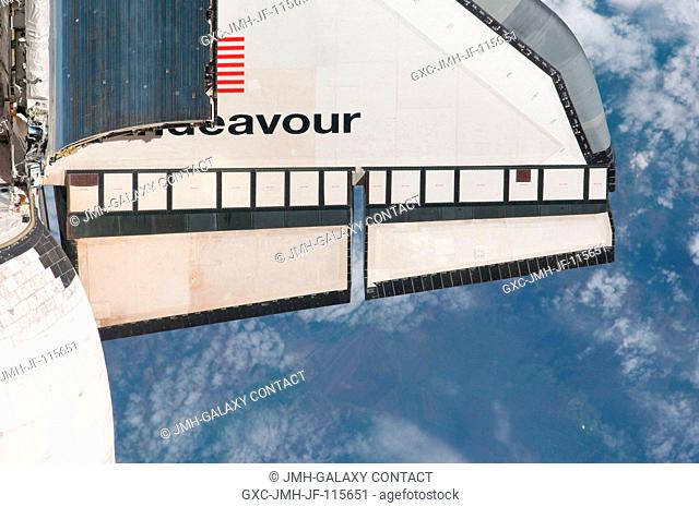 This partial view of the starboard wing of the space shuttle Endeavour was provided by an Expedition 27 crew member during a survey of the approaching STS-134...