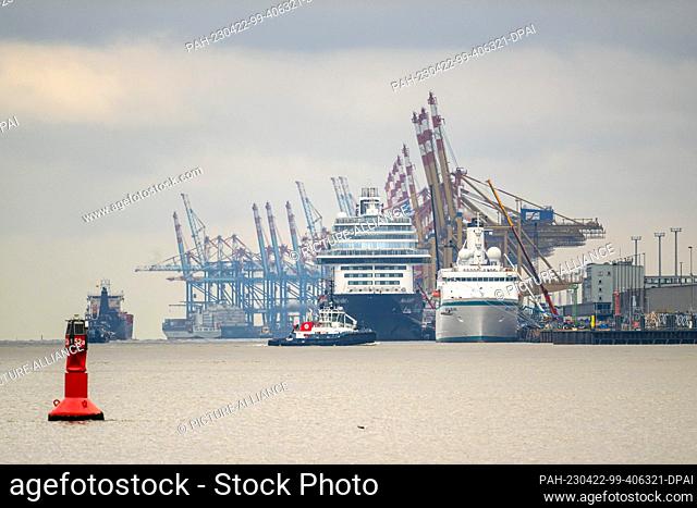 PRODUCTION - 20 April 2023, Bremen, Bremerhaven: The cruise ships ""Mein Schiff 1"" (center) and ""World Odyssey"" (r) are moored at Columbuskaje
