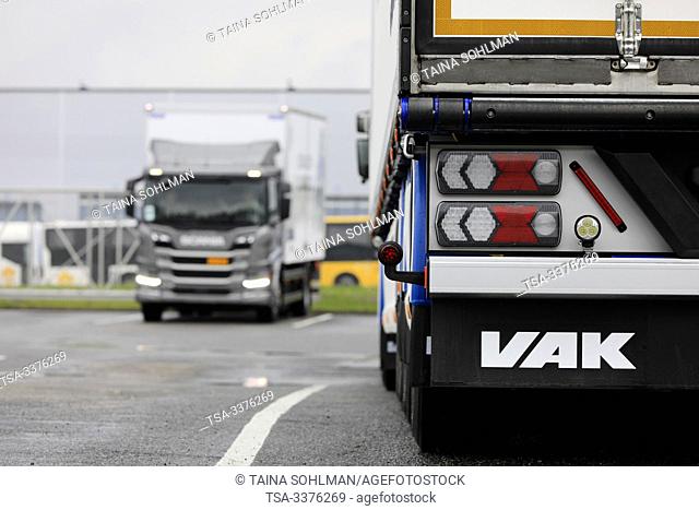 Turku, Finland. August 23, 2019. VAK trailer and Scania CNG/CGB gas powered P340 delivery truck, in camera blur. Scania in Finland 70 years tour