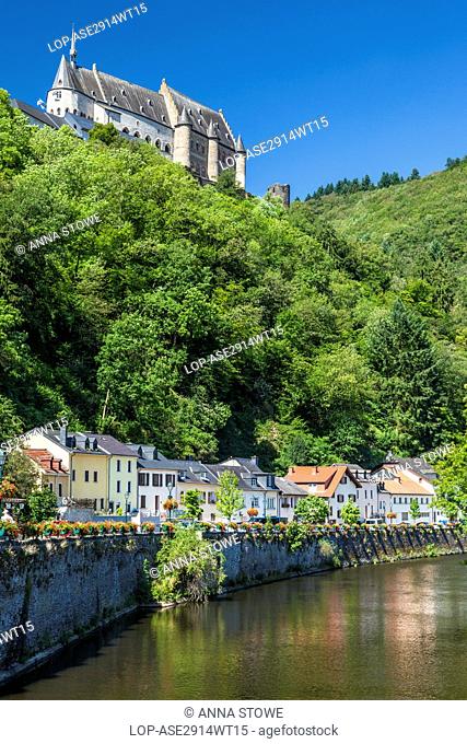 Grand Duchy of Luxembourg, Diekirch, Vianden. View of the castle at Vianden in Luxembourg from the river Our below