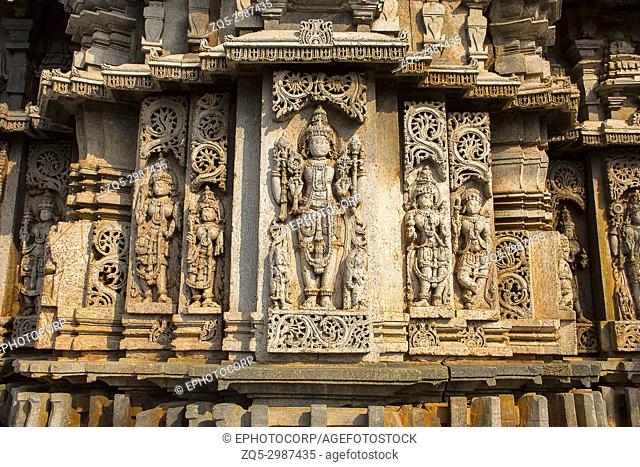 Carvings in external wall. Veera Narayana Temple, Belavadi, Chikkamagaluru district, Karnataka, India