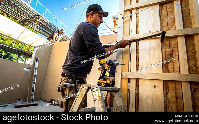 germany, bavaria, construction of a prefabricated wooden house, installation of partition walls