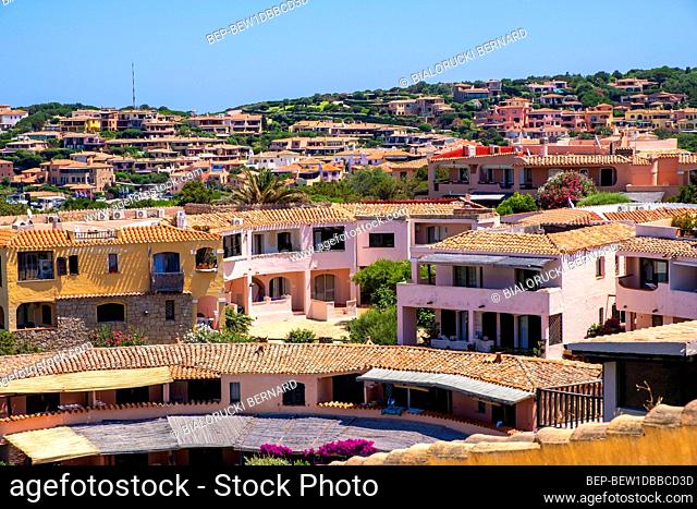 Porto Cervo, Sardinia / Italy - 2019/07/20: Panoramic view of luxury residences of Porto Cervo resort and yacht port at Costa Smeralda coast of Tyrrhenian Sea