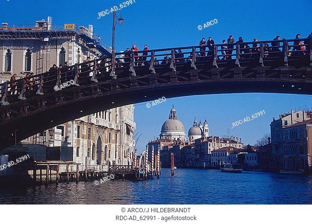 Accademia's bridge over Grand Canal and church Santa Maria della Salute Venice Italyl