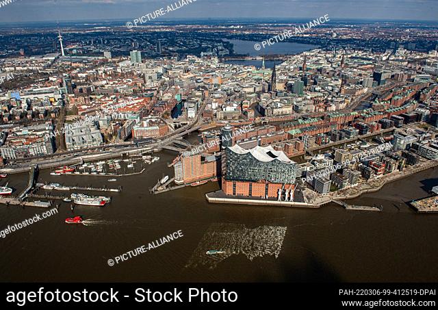 05 March 2022, Hamburg: The aerial view shows the Elbphilharmonie in the port of Hamburg, the Speicherstadt, the Hafencity