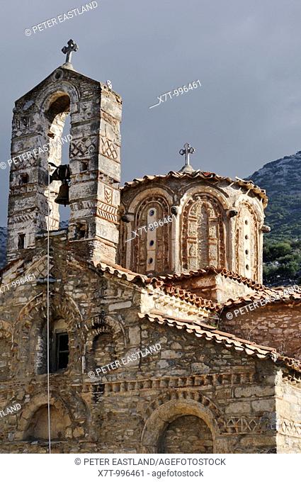 Belfry and dome of the Byzantine church of Agios Sotiris, decorated with closonne brickwork, in the Outer Mani at Langada, Southern Peloponnese, Greece