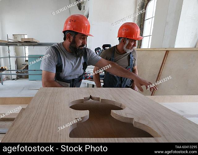 RUSSIA, SIMFEROPOL - JULY 12, 2023: Workers are seen at the Great Friday Mosque under construction; artists from Russia and Turkey are taking part in the dome...