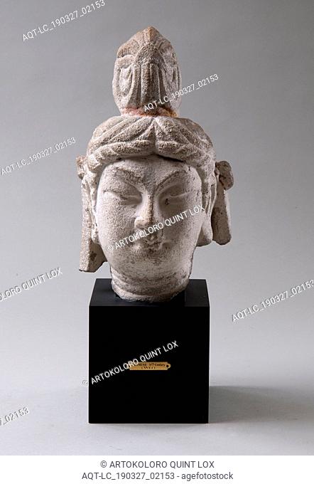 Chinese: Head of a Bodhisattva, Unidentified artist, Chinese, c. 730â€“740, Fine-grain buff-colored sandstone, Overall: 11 3/8 x 7 x 7 1/4 in. (28