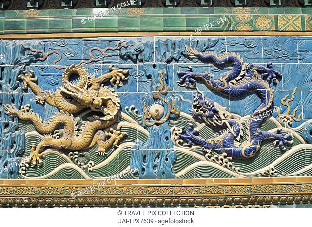 China, Beijing, Beihai Park, Detail of the Nine Dragon Screen