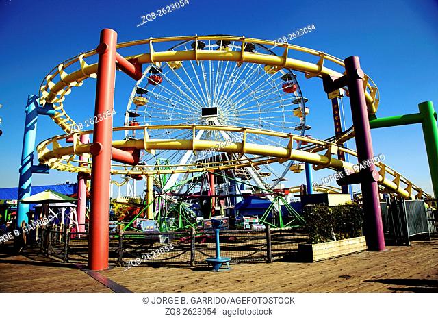 Ferris wheel against a blue sky santa monica pier