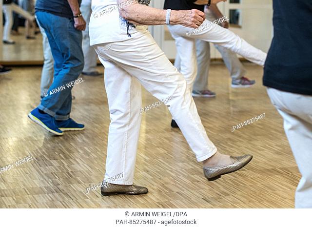 People with Parkinson's disease dance in Regensburg,  Germany, 27 September 2016. People with Parkinson's disease can hardly hide it