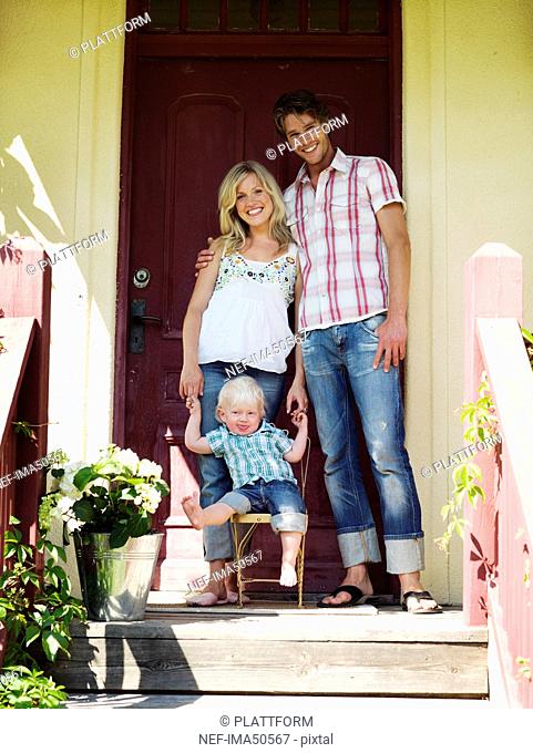A family in front of a house, Stockholm, Sweden