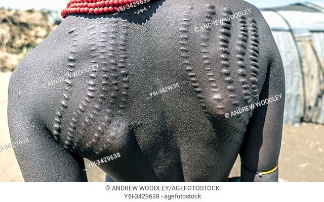 Scars decorate the bodies of Dassenach tribe women Ethiopia