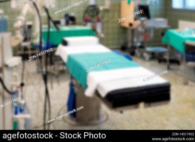 defocused operating room in a hospital - medical healthcare surgery concept - blurred background with copy space