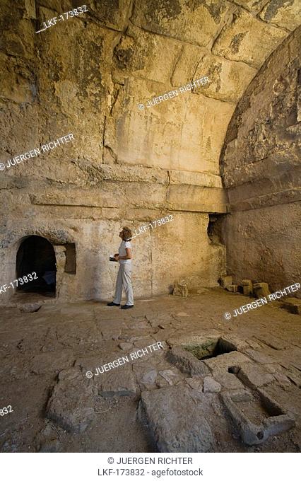 Tourist inside the Royal Tombs, Tomb of the Kings, Archaeology, Salamis, North Cyprus, Cyprus