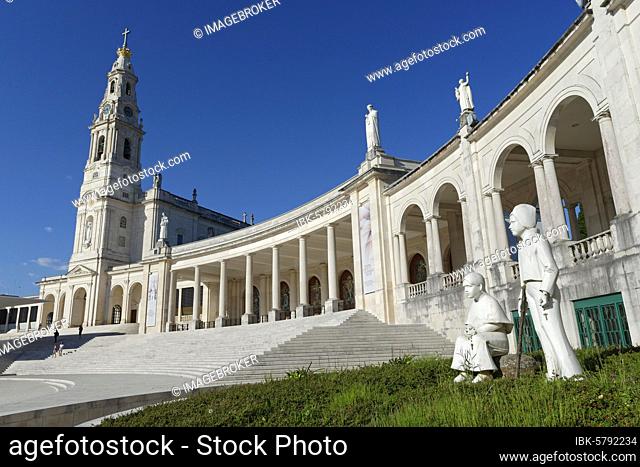 Statues of two little shepherds in front of the Basilica of Our Lady of the Rosary, Fatima, Ourém, Portugal, Europe