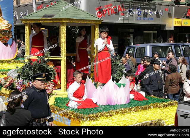 A Buddhist parade in Chinatown, Manhattan, New York. USA