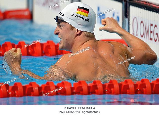 Steffen Deibler of Germany celebrates after men's 50m butterfly semifinals of the 15th FINA Swimming World Championships at Palau Sant Jordi Arena in Barcelona