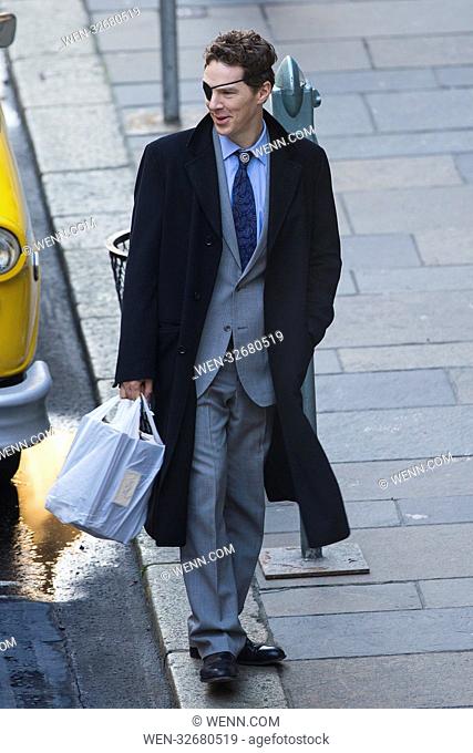 Benedict Cumberbatch filming scenes for new TV adaptation of 'Melrose' in Glasgow, Scotland. The Actor was seen running across the road which the production has...