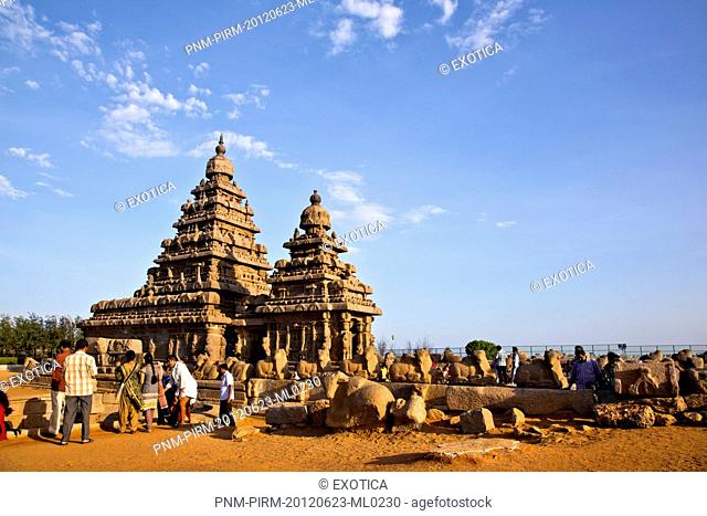 Tourists at a temple, Shore Temple, Mahabalipuram, Kanchipuram District, Tamil Nadu, India
