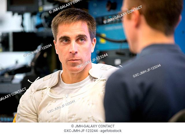 NASA astronaut Chris Cassidy, Expedition 3536 flight engineer, prepares for a spacewalk training session in the waters of the Neutral Buoyancy Laboratory (NBL)...
