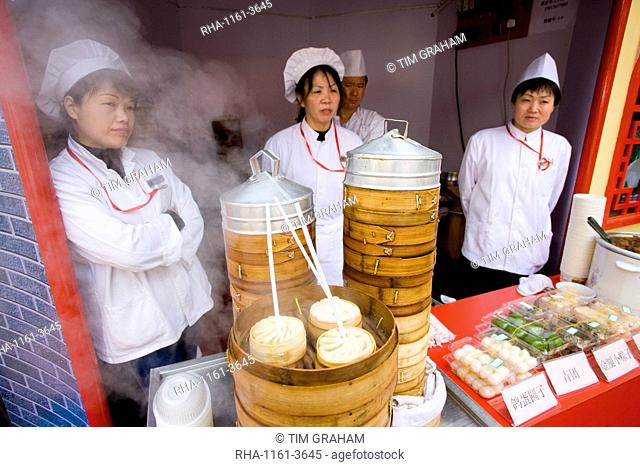 Soup dumplings stall in the Yu Garden Bazaar Market, Shanghai, China