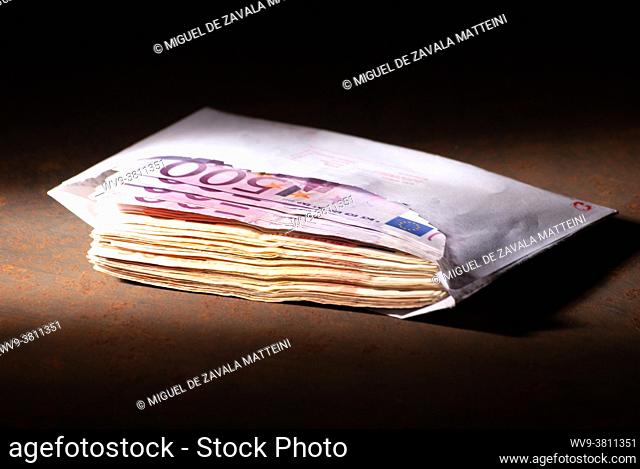Euro banknotes in envelopes