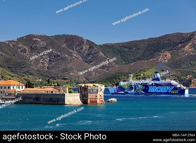 Ferry departing from the port of Porto Azzuro, Elba Island, Livorno Province, Tuscany, Italy