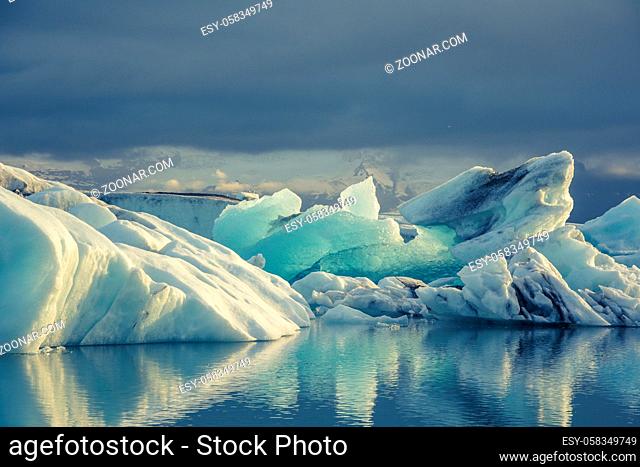 Iceberg in Jokulsarlon glacier lake in Iceland. The icebergs, originating from the Vatnajokull float. This location was used for various action movies