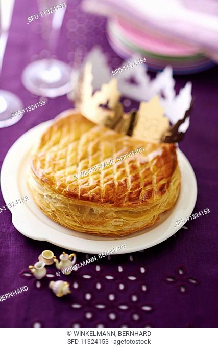 Puff pastry chocolate cake decorated with a crown (France)