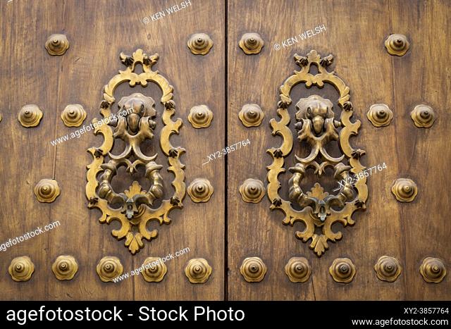 Decorative door knockers. Cordoba, Cordoba Province, Andalusia, southern Spain