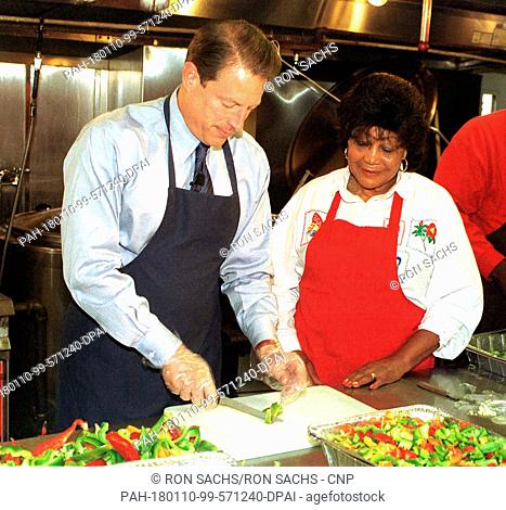 United States Vice President Al Gore dices vegetables for soup at Martha's Table, a shelter that provides meals to the homeless in Washington, D.C