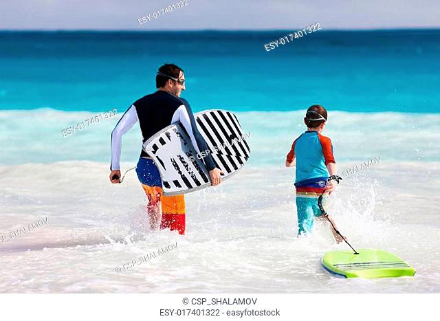 Father and son surfing