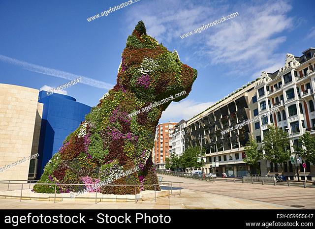 View of the ""Puppy"" the famous sculpture by Jeff Koons in the outdoors of the Guggenheim museum, Bilbao, Biscay, Basque Country