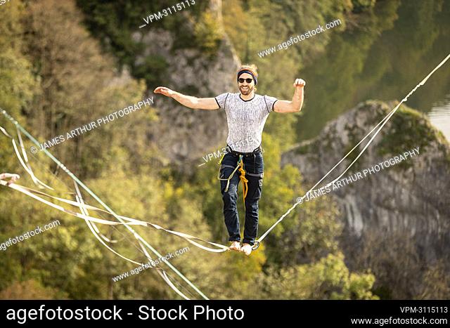 Highliner Tom Boegler pictured during the Belgian highline record attempt, at the Freyr climbing site, near Dinant, Sunday 17 October 2021