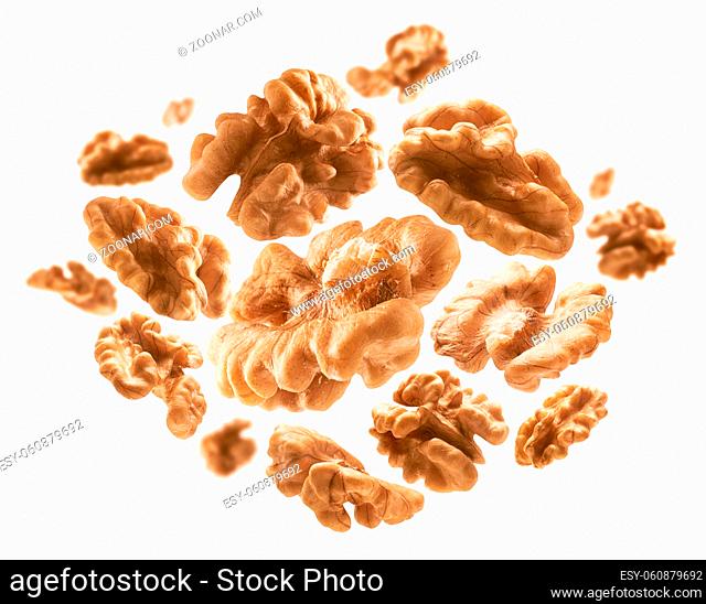 Peeled from the shell, walnut kernels levitate on a white background