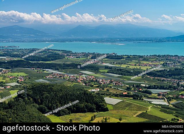 Aerial view of a landscape on Lake Constance with forests, orchards, villages and Lake Constance in the background