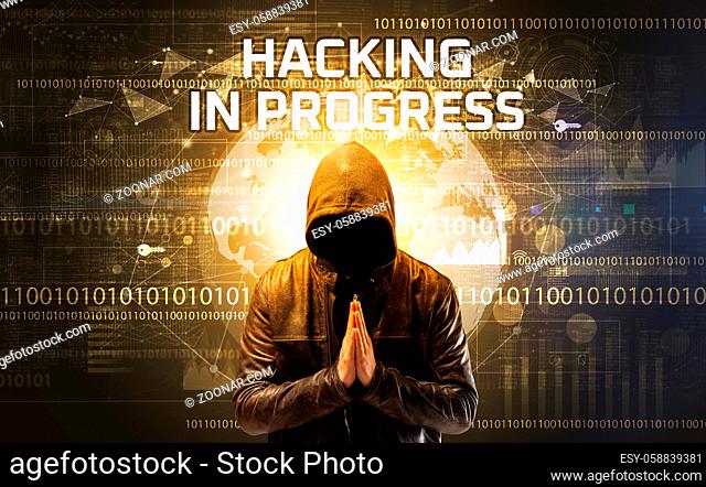 Faceless hacker at work with HACKING IN PROGRESS inscription, Computer security concept