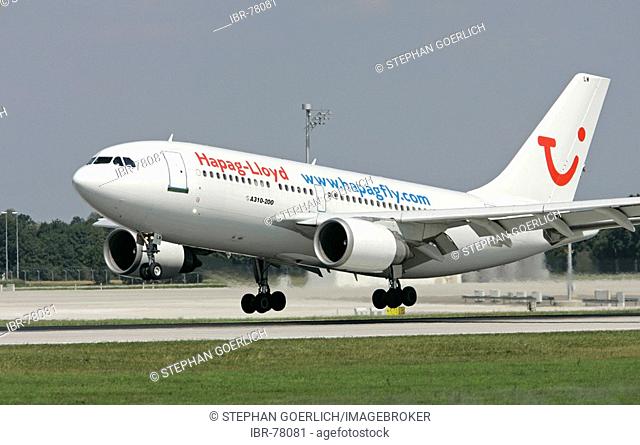 Munich, GER, 11. Aug. 2005 - A Hapag Lloyd jet of type Airbus A310-200 touch down at Munich Airport
