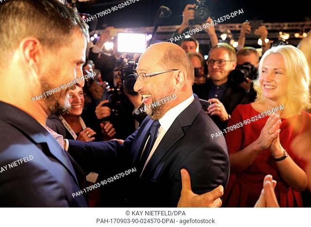 Candidate for chancellor and SPD chairman Martin Schulz (SPD, c) greets his party members after the TVÂ duel between him and Chancellor Merkel (CDU)Â in the...