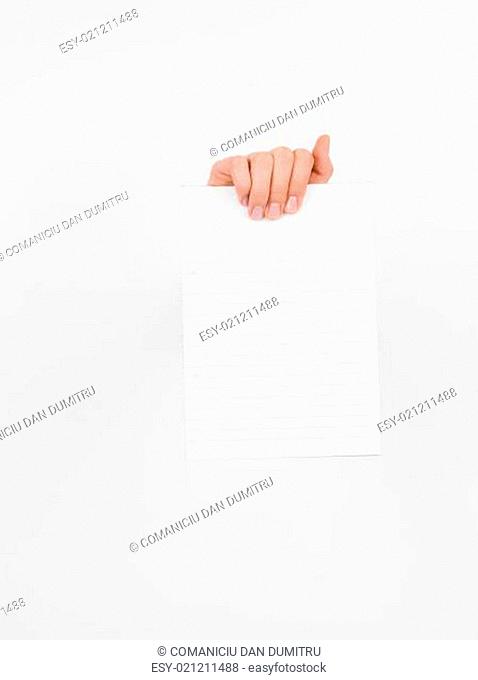 female hand holding a white paper