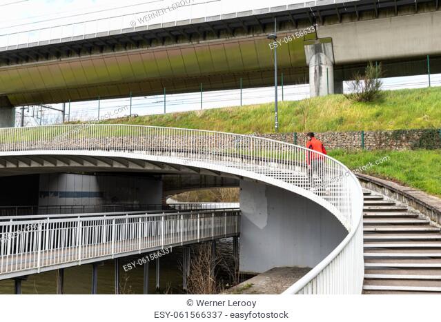 Ghent, Flanders Region, Belgium. Pedstrian and cycling bridge under the highway