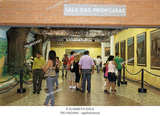 Aparecida Brazil Sao Paulo State Basilica Of The National Shrine Of Our Lady Of Aparecida People Looking At Paintings Of Miracles Of Our Lady Aparcida In Sala...