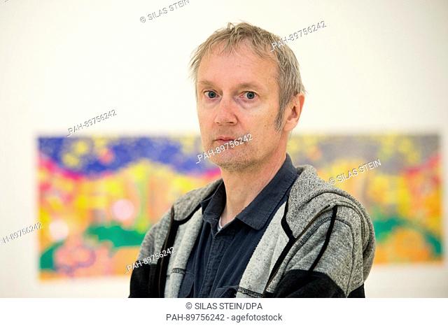 The filmmaker and author Wenzel Storch from Hildesheim looks into the camera at the Sprengel Museum in Hanover, Germany, 10 April 2017