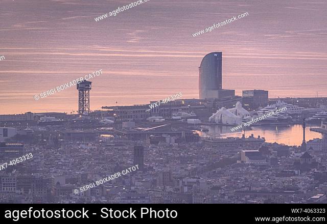 Panoramic of Barcelona in a winter sunrise, seen from the Tibidabo mountain (Barcelona, Catalonia, Spain)